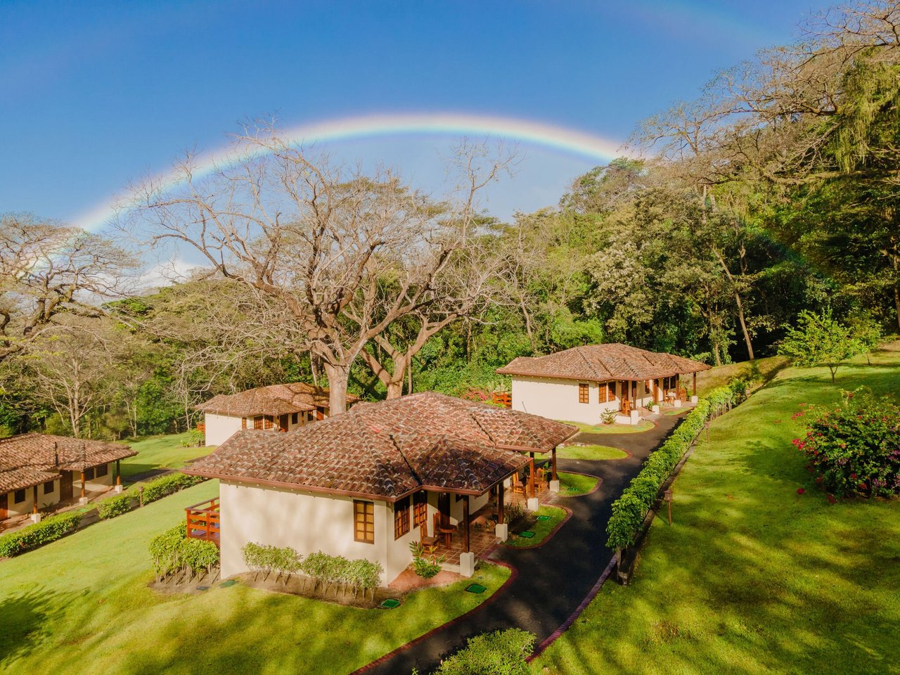 Borinquen Thermal Resort — bungalows under a rainbow