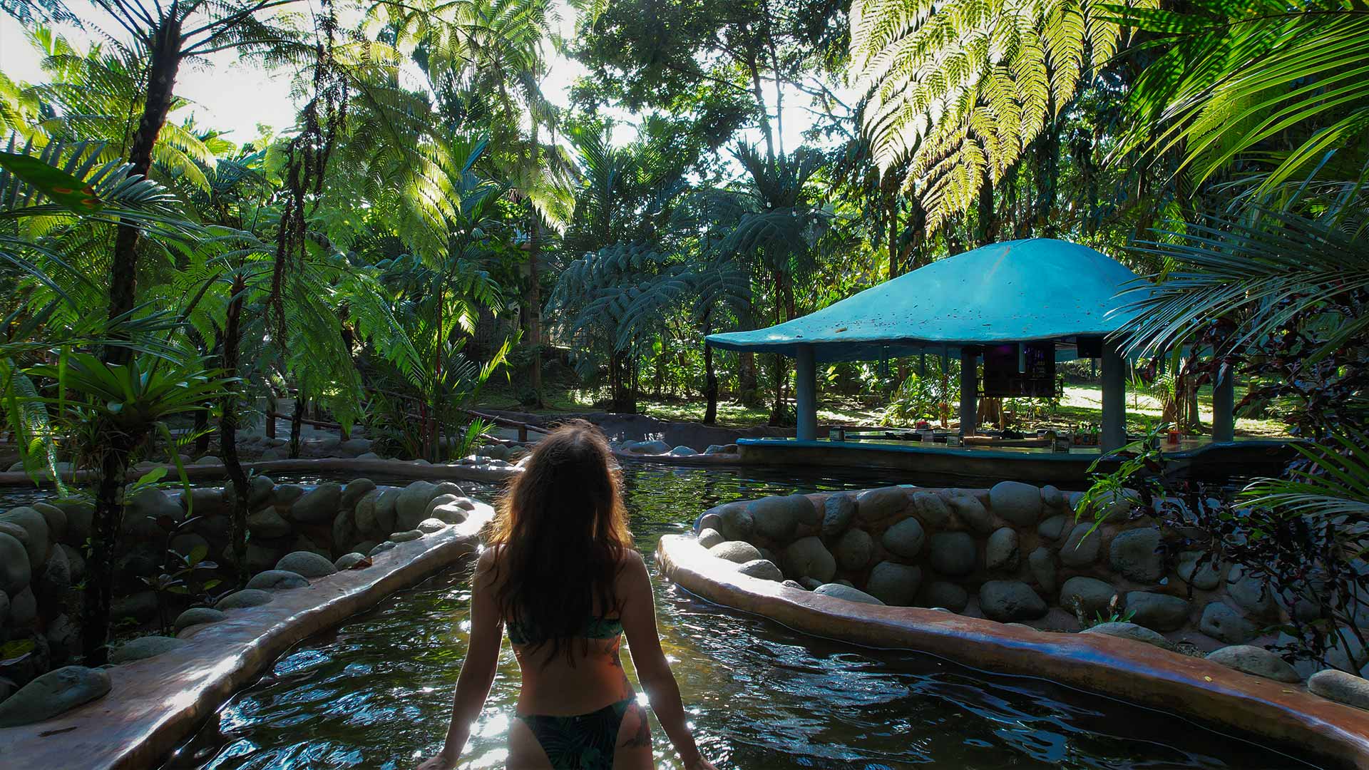 Volcano Lodge & Thermal Experience — hot-spring channels in the rainforest